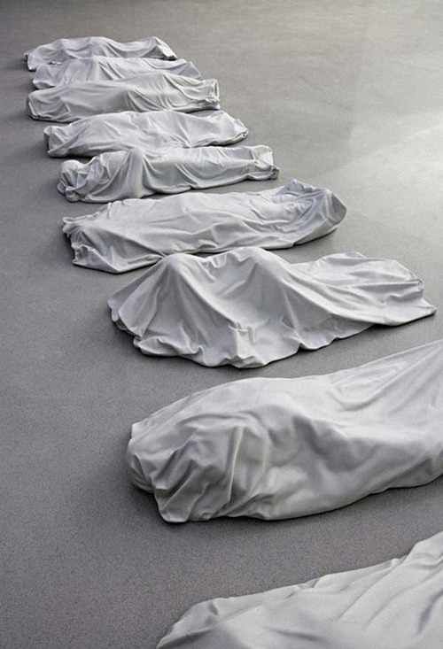 maurizio cattelan body bags